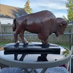 The classic brown buffalo statue