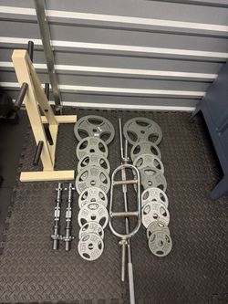 One inch plates, barbells and storage