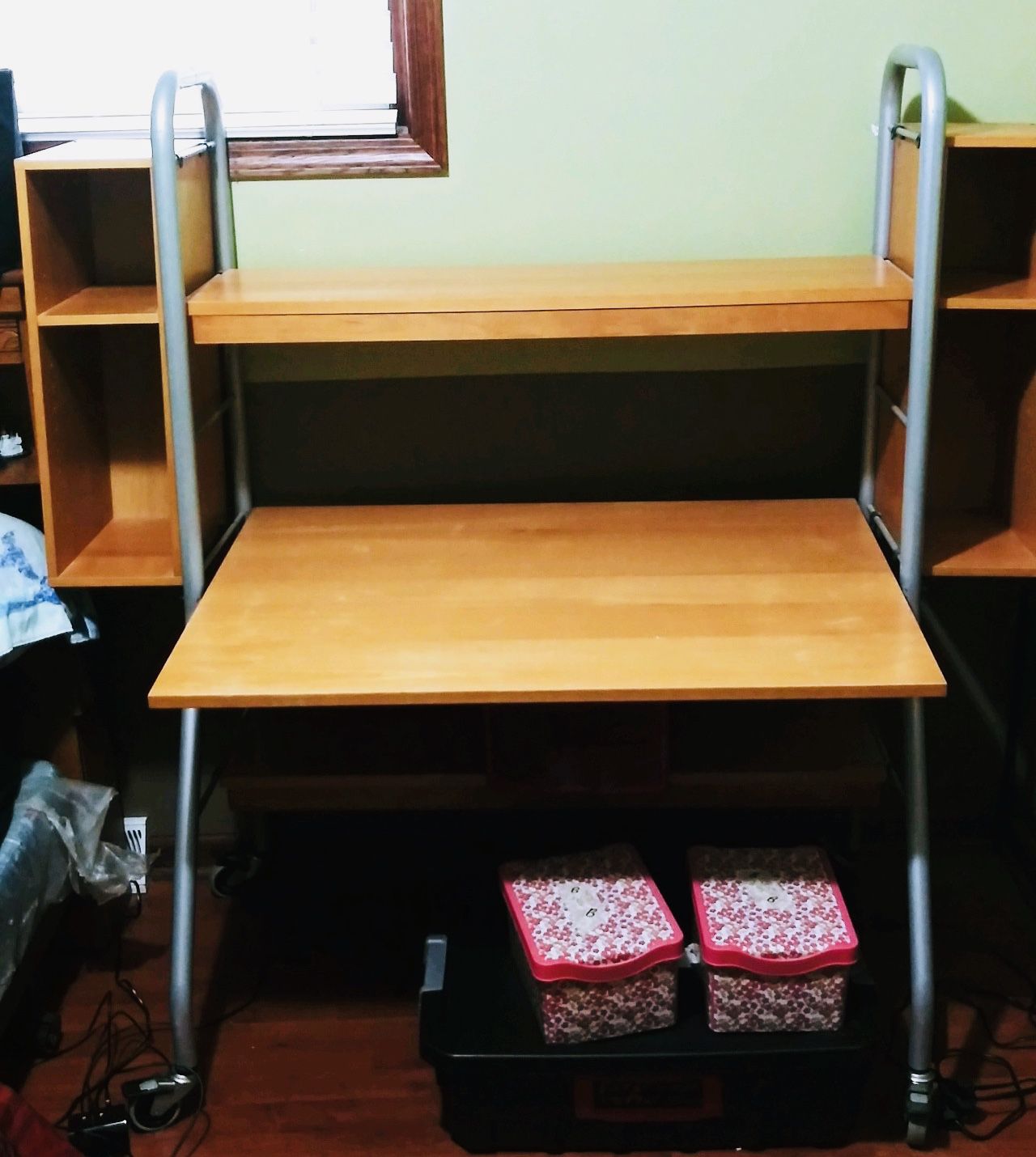 Desk, Artist made of Wood and Metal. Very sturdy. Cubbies can be removed from either side. We just liked having both attached.