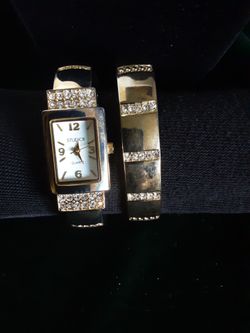 Quartz Studio women's cuff watch with sparkling crystal accents and matching bracelet