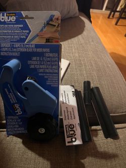 Tape and paper dispenser