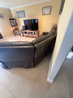 Black leather sectional couch. Price negotiable