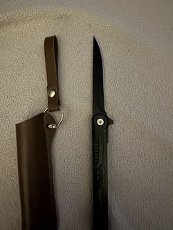 Assisted Opening Knife And Leather Case