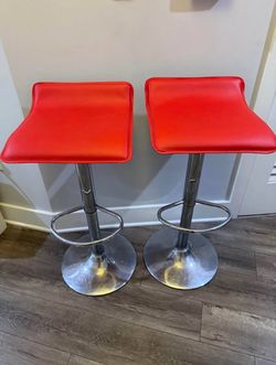 Pair of Red Swivel Bar Stools