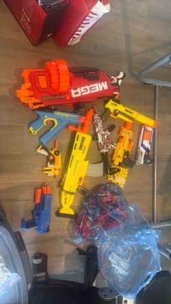9 Nerf Guns and Bullets