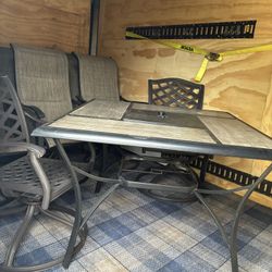 Table And 2  Swivels Chairs  $225.00