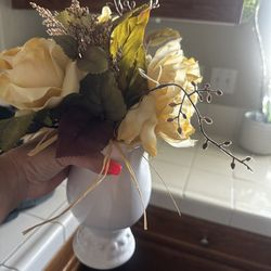  vase with artificial flowers 