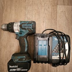 Makita LXT brushless Drill.with a 5 Ah battery with charging