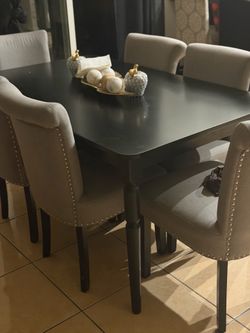 Dining table and chairs 3 months old great condition price firm