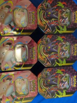 Pokemon mega Gengar and Clefable tins