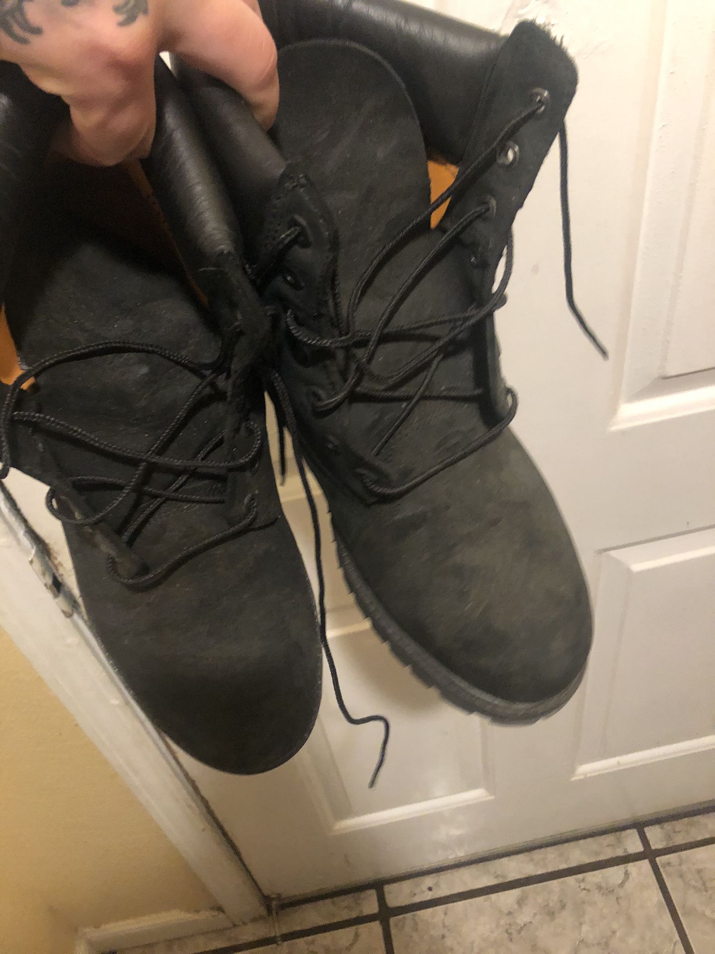 two pairs of men’s 10.5 timberland