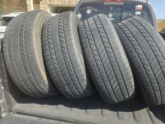Four Used Bridgestone tires 235/60 R18 -1071