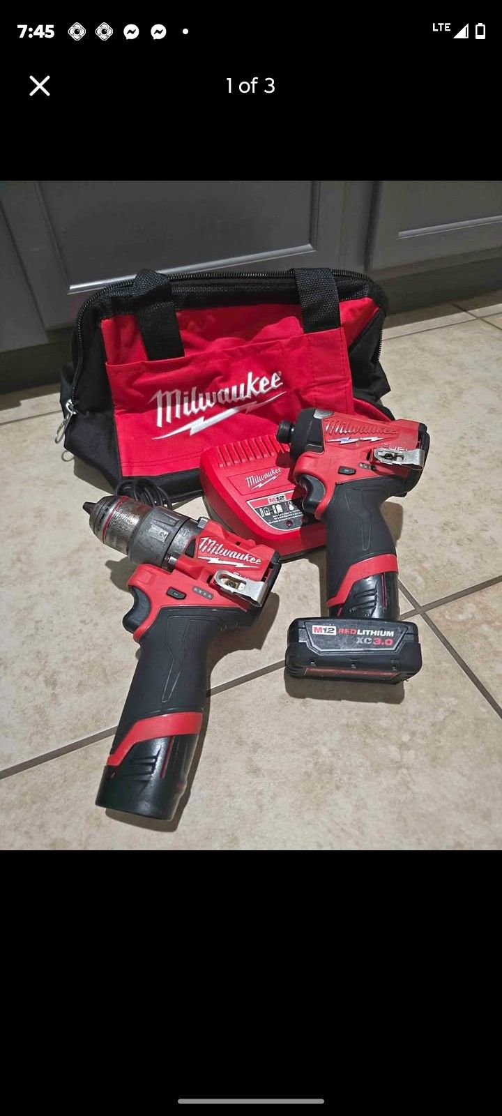 Milwaukee Impact Set And Two Batteries With Charger