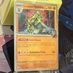 Team Rocket's Tyranitar 096/182 DRI Pokémon Center Exclusive Sealed Promo
