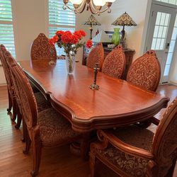 Dining table, 10 chairs and China