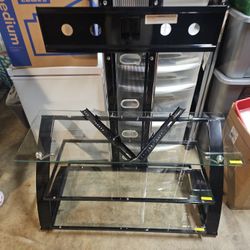 TV Stand With 3 piece Glass Shelfs.
