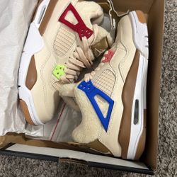 Jordan 4 WILD THINGS size 5Y