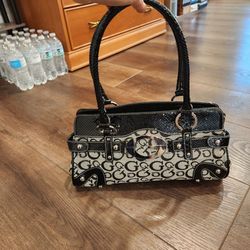 Guess monogram shoulder bag with distinctive crocodile-embossed leather trim, clean and great condition