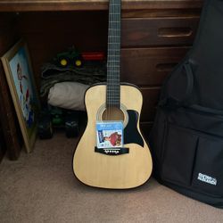 Child’s Guitar! New never Used still has plastic on pick guard...