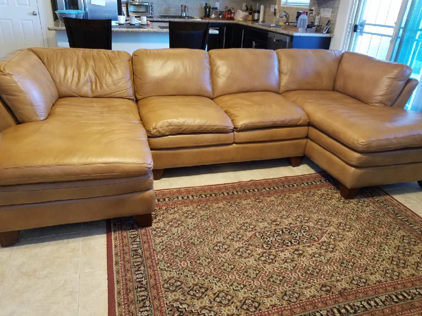 Great 100% leather couch, your house needs it