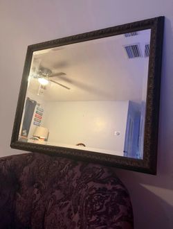 Large ornate frame beveled mirror
