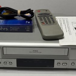 Magnavox VCR with remote, cables, sony tape, quick start guide