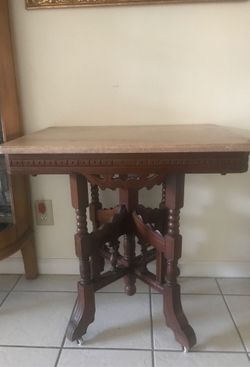 Antique Eastlake Carved table With Marble top 