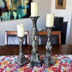 Set of three candle holders
