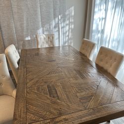 Dining table by Ashley