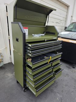 TOOL STORAGE HUSKY Standard Duty 42 in. x 18 in. D 12- Drawer Matte Army Green Roling Tool Chest Combo has a dent