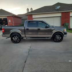 WILLING TO TRADE FOR CHEVY/GMC TRUCK OR BMW 6 SERIES..2006 FORD F150 LARIAT 149,000 MILES NEW 26s /TIRES-CLEAN TITLE- CLEAN INSIDE AND OUT  $9000