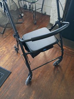 Walker with seats and compartments