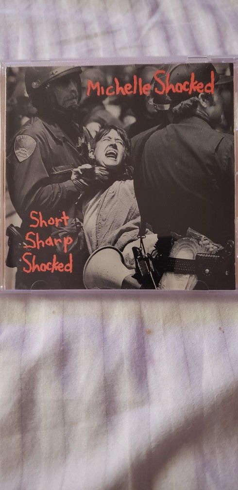 Short, Sharp, Shocked CD by Michelle Shocked. New in Shrink Wrapped Jewel Case!