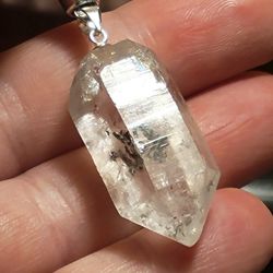 STUNNING HERKIMER Diamond w/ Moving Water Enhydro + Rainbow Inclusions Pendant .925 Sterling Silver

One of a kind 

over 500 million years old with m