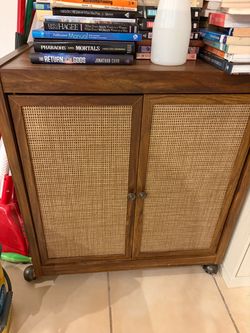 Wood Cabinet with Cane Door Panels