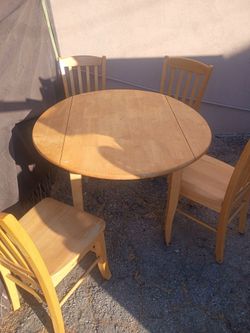 Drop leaf table for chairs