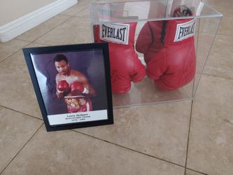 Larry Holmes signed Boxing gloves, Autographed by Larry Holmes $300 OBO