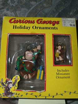 This vintage Trevco Curious George holiday ornament set features a main figure wrapped in tinsel and a bonus miniature ornament.