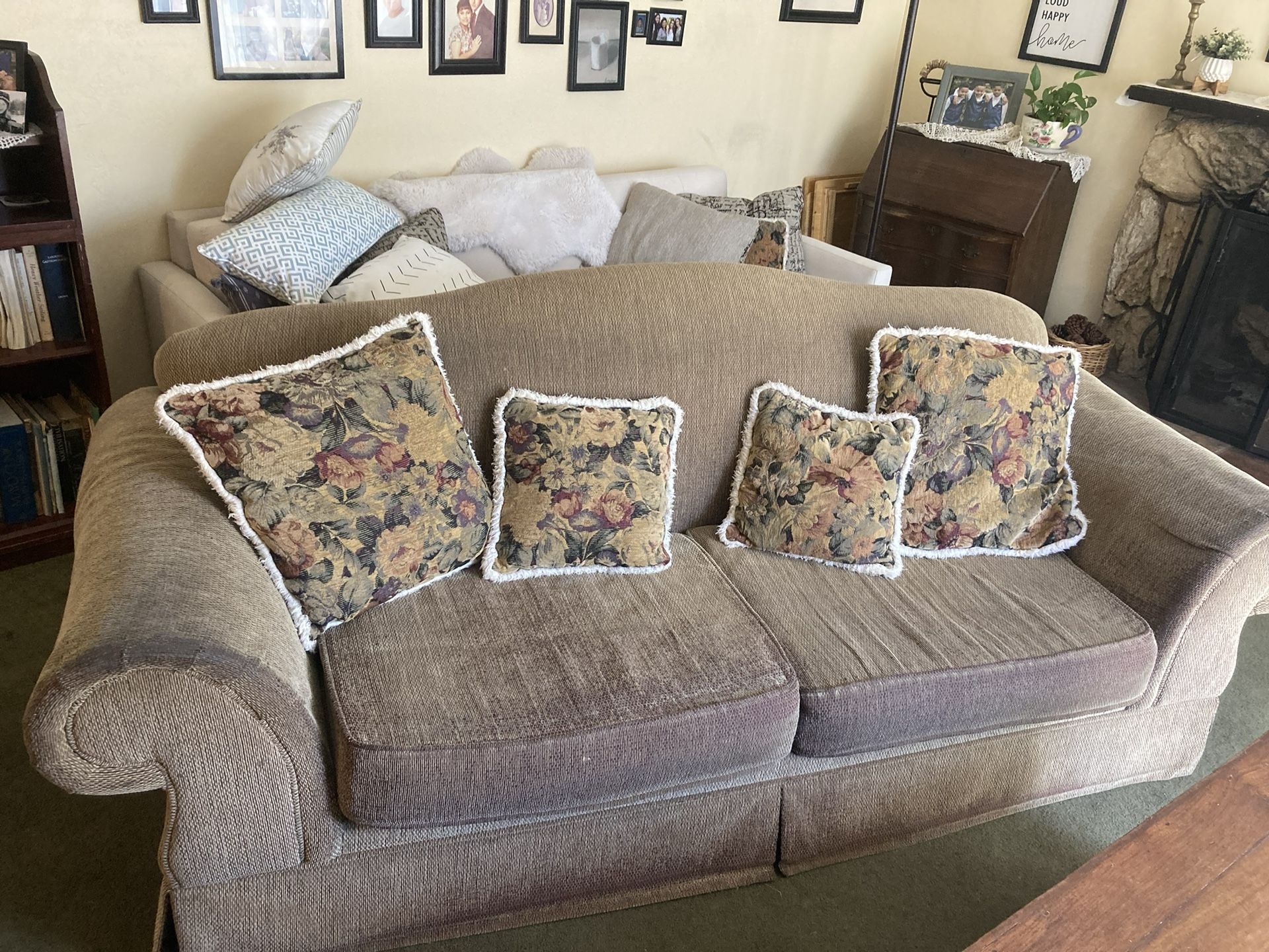 A Love Seat And A Couch