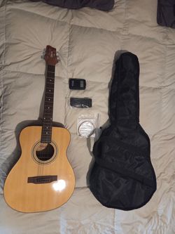 Telluride Guitar comes with strap,tuner and case