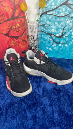 Air Jordan Low-Top Sneakers Black Red, size 8 ( pre- owned) in great condition.