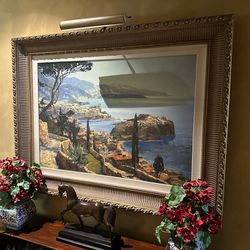 Mediterranean painting with beautiful frame and light