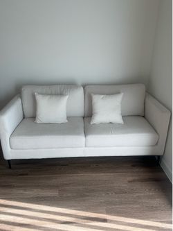 White/cream couches