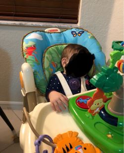 High chair with jungle toy