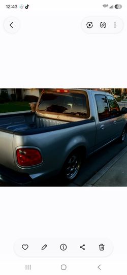 2003 Ford F-150  4 -door  cherry bro