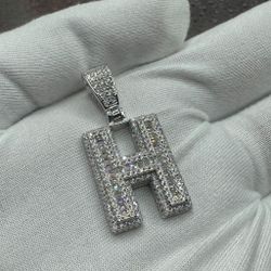 A Moissanite Initial in Sterling Silver with a CTW of 2.42 in Bugget Style