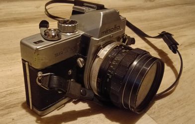 Vintage Minolta SR-T 1 series 35mm film with 52 mm filter