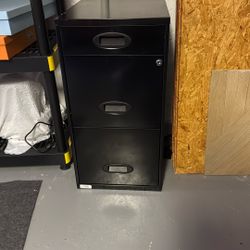 Three drawer file cabinet