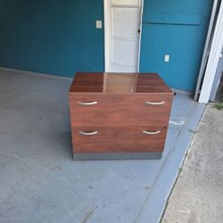 Very sturdy Brown filing cabinet (Delivery available)