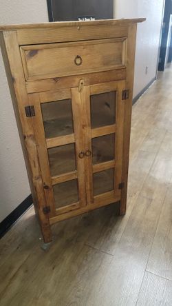 Wooden  pie cabinet with glass doors and wooden drawers